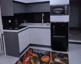 آشپزخانه، هود، یخچال، ماکروویو و کابینت های های گلاس ویلا در بهشهر 14584754584