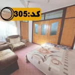 اتاق خواب با تخت 2 نفره و کمد دیواری های چوبی خانه ویلایی در بهشهر 841844846=