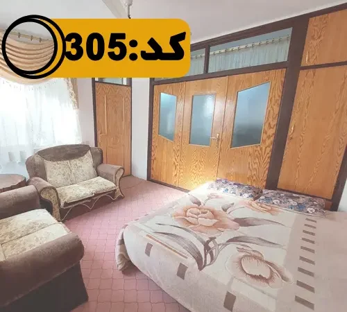 اتاق خواب با تخت 2 نفره و کمد دیواری های چوبی خانه ویلایی در بهشهر 841844846=