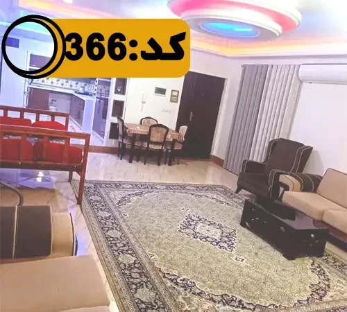 اتاق پذیرایی فرش شده و آشپزخانه آپارتمان در بهشهر 4589646574