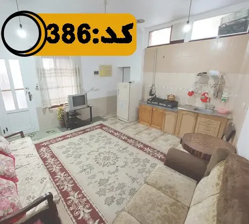 اتاق پذیرایی با میلمان و فرش، آشپزخانه خانه ویلایی در بهشهر 154456