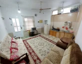 اتاق پذیرایی با میلمان و فرش، آشپزخانه خانه ویلایی در بهشهر 15456